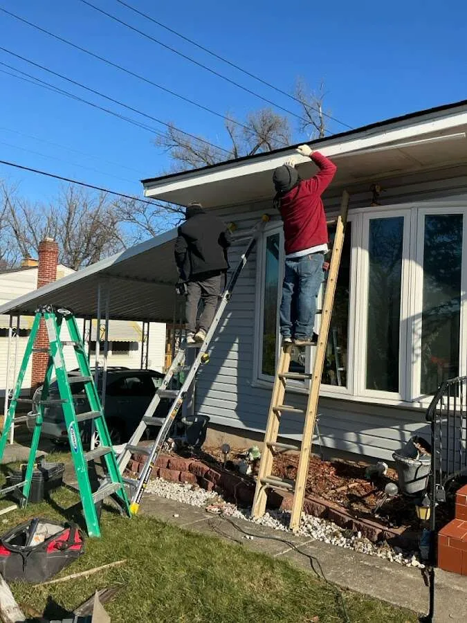 Restoration crew performing exterior repair in Manlius